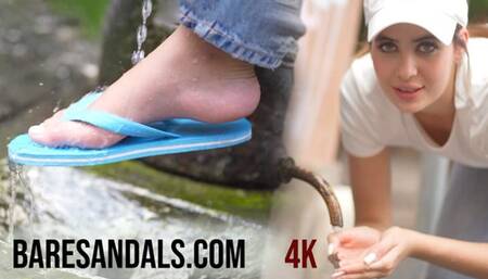 Pamela feet and flip flops getting wet under the fountain - 25012 - 4K