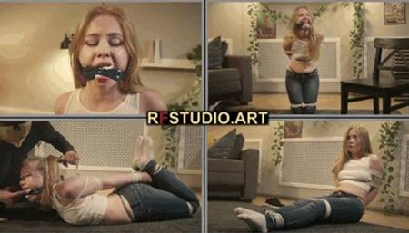 Olesya Bound by the Rigger Part 1 - Cleave Gag, Chair Tie, and Tight Hogtie (HD 720p MP4)