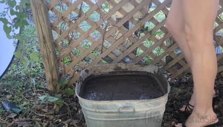 Fifi loses a brand new pair of black strappy stilettos into her deep bin of mud *new*