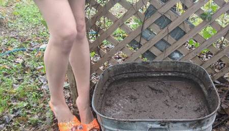 Fifi loses a brand new pair of orange buckle strap stilettos into her deep bin of mud *new*