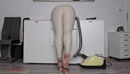 Mila - Thoroughly vacuuming behind sideboard