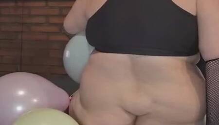 Nude Sit Popping Balloons