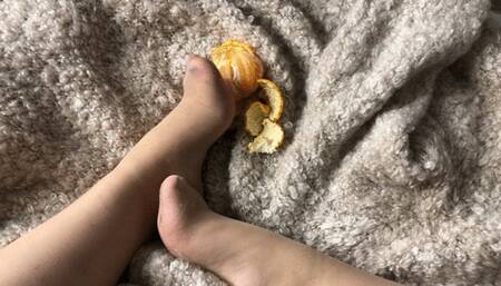Feet tease with oranges!