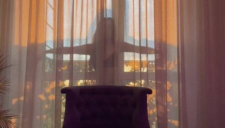 Violeta does a sensual striptease and dances to music in black lingerie