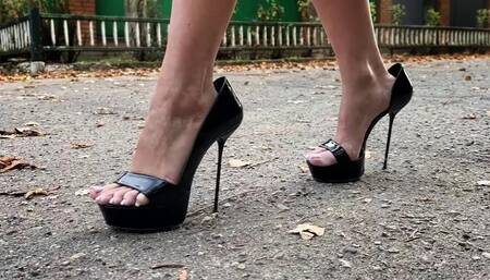 Walking in Oversize high heels sandals, girl in unclosed high heels sandals, high heels