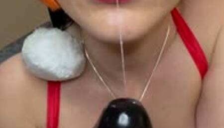 Mrs Clause sucks dildo