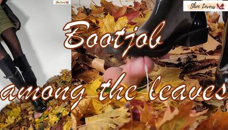 Bootjob, cockcrush among the leaves with black rain boots picture in picture