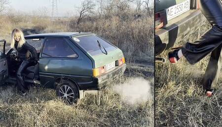 Anastasia revving her smoky ZAZ and playing with exhaust fumes