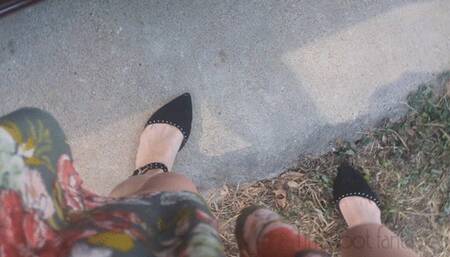 Fifi driving in black velvet studded flats replay