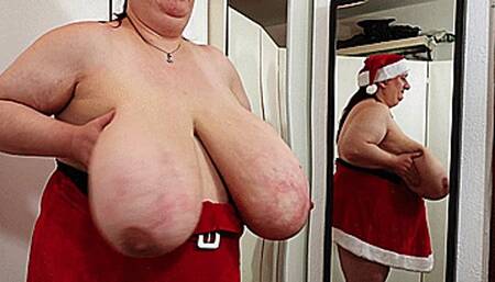 Maja meets Sunniva Part 141 - Miss Santa Sunni shows her massive Breasts (Clip No 2793 - mp4 version)