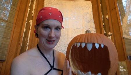 Woman dressing up as a topless domme witch