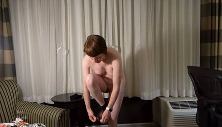 Woman trying on various bikinis and a swimsuit