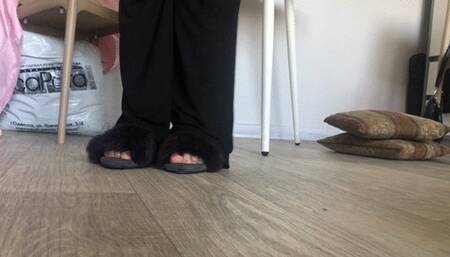 Feet in fur slippers!