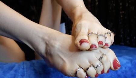 Worship my perfect feet in red toenail polish and toe rings