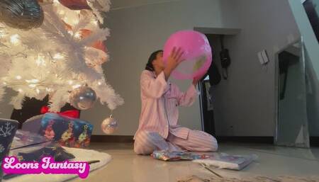 Akina plays with 3 beach balls in the middle of the night