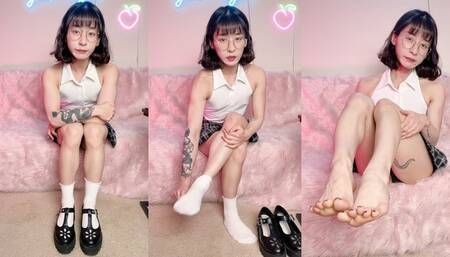 Cute, fit Asian girl shares her honest thoughts on foot fetishes while taking off her shoes and socks