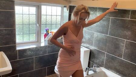 Toni wets her panties in the bathroom