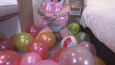 Tallulah's balloon popping fun