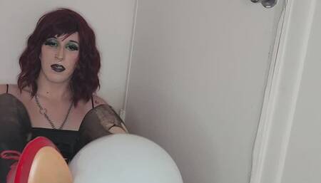 Little goth cutie in heels pops balloons