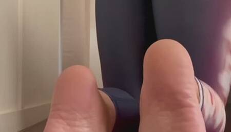 Close up barefoot sole tease in yoga pants