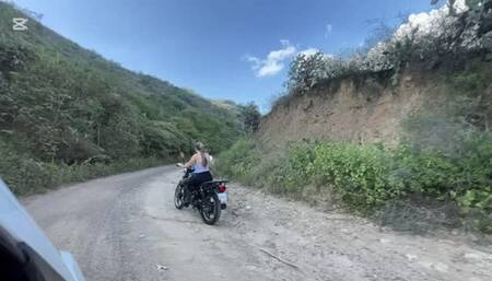 Jarlyn drives the motorcycle in the unstable terrain