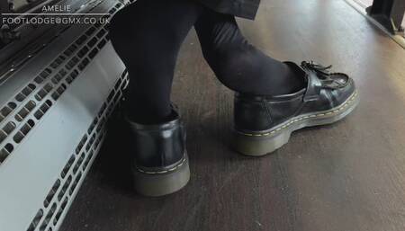 Close up candid Shoeplay in loafers and tights on the bus