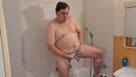 A Chubby Guy Kneads His Cock in the Shower