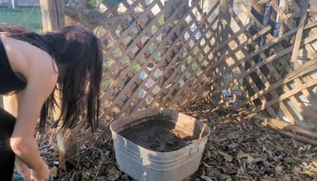 Fifi stepping into deep bin of mud and covering her clothes and body in mud *new*