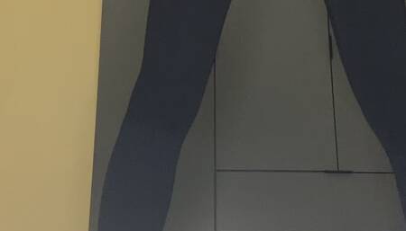 Malena squats in yoga pants, leggings