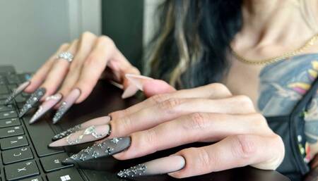 Writing typing on keyboard with my long nails, claws