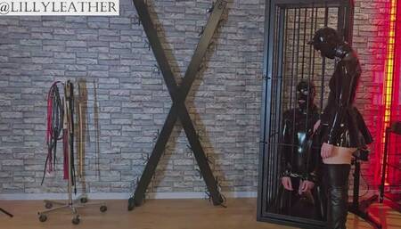 Latex domina plays with her slave in an BDSM studio before he has to eat his own cum