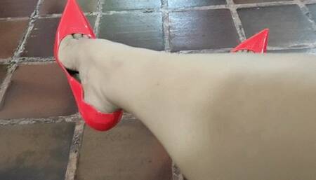 Stephanie sexy dangling in nude pantyhose and red stilettos