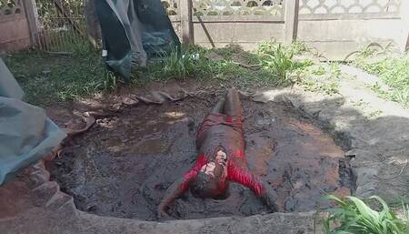 Muddy fun in red pvc dress