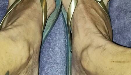 Tempest showing off bare toes and calves