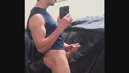 Hot young guy masturbating his big cock in dorm room