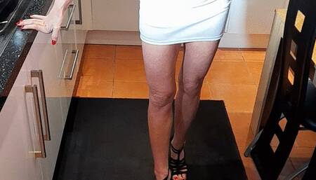 Giantess Raven Lee crushes a Plymouth Barracuda toy car in sexy heels with painted toenails full body view