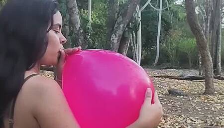 Taking a walk in nature and blowing up balloons in public!