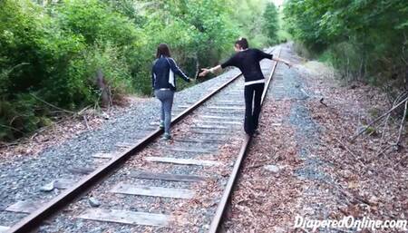Mia & Taylor: Playing on Train Tracks