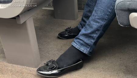 More candid shoeplay fun on the train