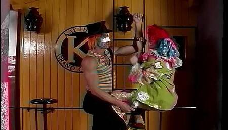 two clowns laughingly fuck each other's holes