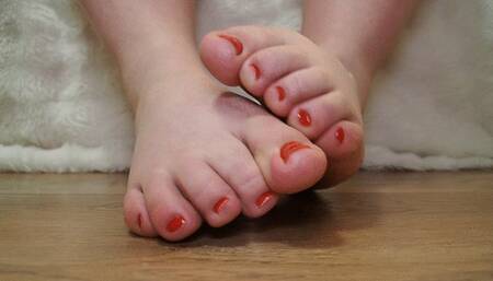 Toes with red pedicure