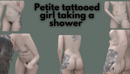Petite tattooed girl taking a shower