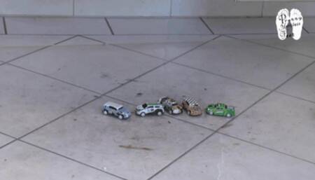 Tin Cars under hard wooden Clogs