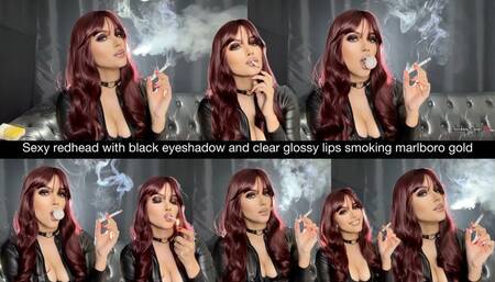 Sexy redhead with black eyeshadow and clear glossy lips smoking marlboro gold