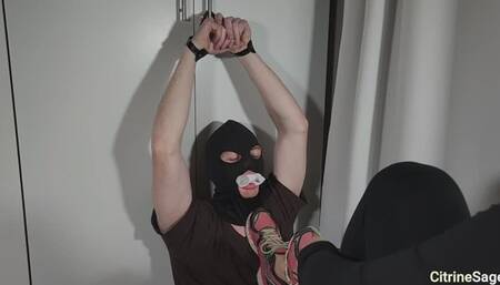 Foot slave is left bound and gagged whilst I workout then has to clean my shoes and feet