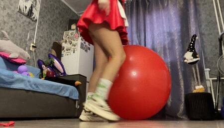 Val jump in dress on big red ball