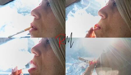 00050 # a cigarette in the car with perfect backlighting