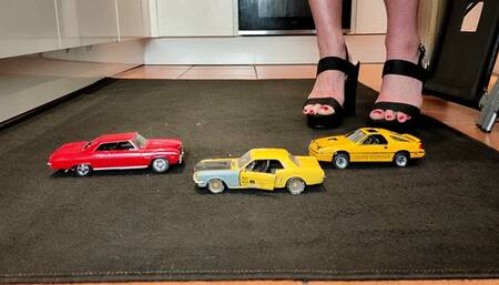 Giantess Raven Lee crushes uses 3 cars as stepping stones in big black chunky heels with painted toenails low close up view