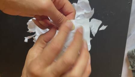 Destroying paper with my long, sharp, natural nails
