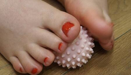 Silence and Relaxation: Playing with a Massage Ball with Feet
